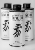 UJA-branded bottle of 100% extra virgin olive oil from Israel, featuring a black olive branch illustration on a white background.