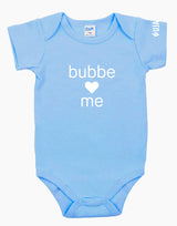 Blue onesie that says "bubbe loves me" in white letters on the front. There is a heart instead of the word love. 