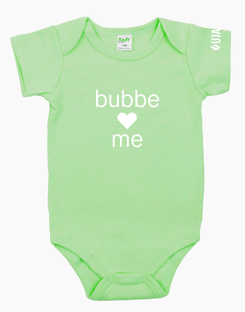 Green onesie that says "bubbe loves me" in white letters on the front. There is a heart instead of the word love. 